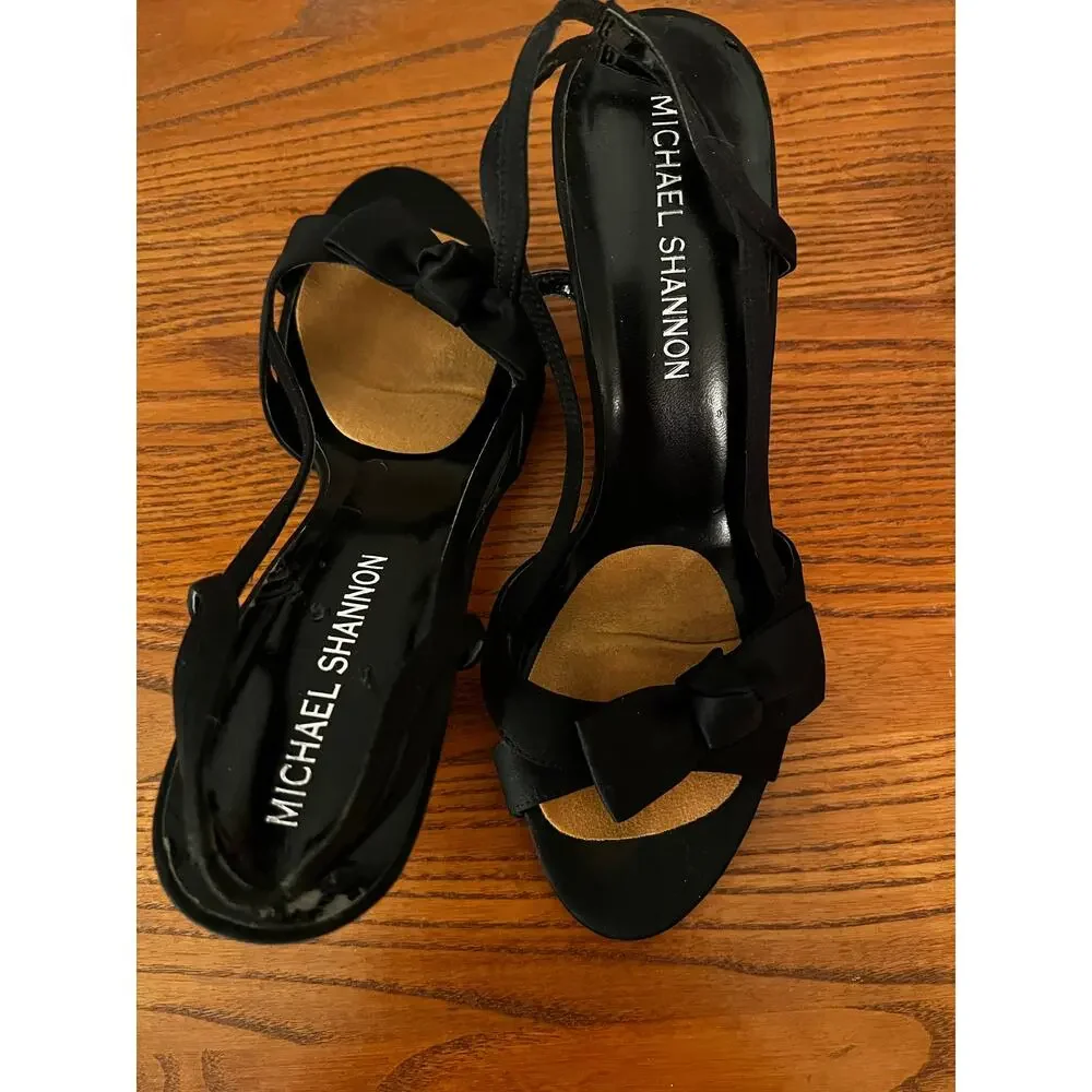 Michael Shannon black sling back heels with bow accent Size 8